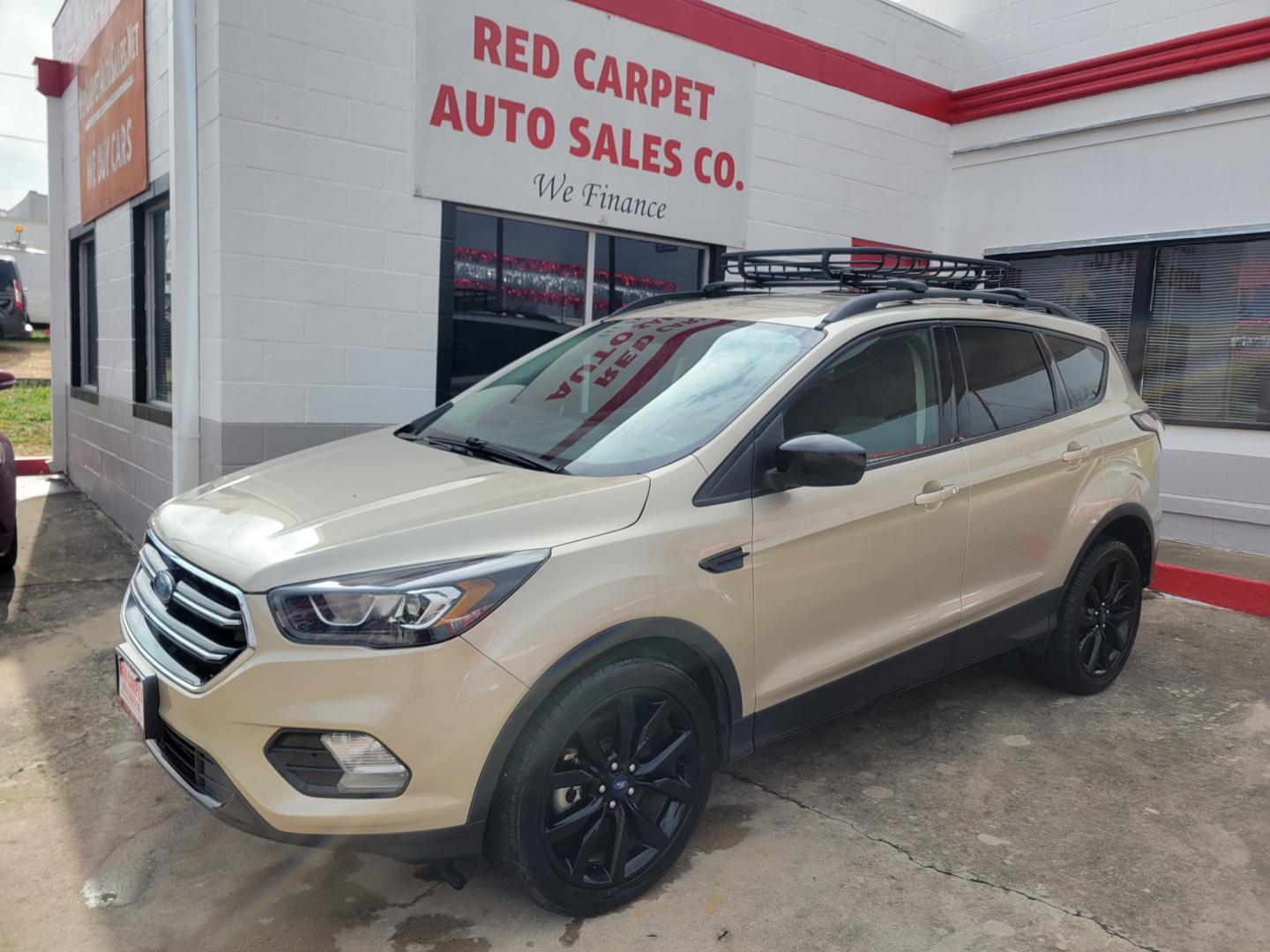 2018 Gold Ford Escape (1FMCU9GD5JU) with an 1.5L I4 F DOHC 16V engine, Automatic transmission, located at 503 West Court, Seguin, TX, 78155, (830) 379-3373, 29.568621, -97.969803 - 2018 Ford Escape SE 4WD with a 1.5L I4 F DOHC 16V, Automatic, Tilt, Cruise, AM/FM/CD Touchscreen Stereo, Power Windows, Locks, Seat and Side Mirrors, Bluetooth, Navigation, Automatic Headlights, Dual Climate Control, Rear A/C, Heated Seats, Tinted Windows, Luggage Rack, Backup Camera, Bumper Sensors - Photo#0